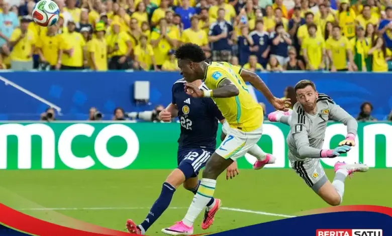 Vinicius Mengamuk, Brasil Benamkan Skotlandia dan Kunci Juara Grup